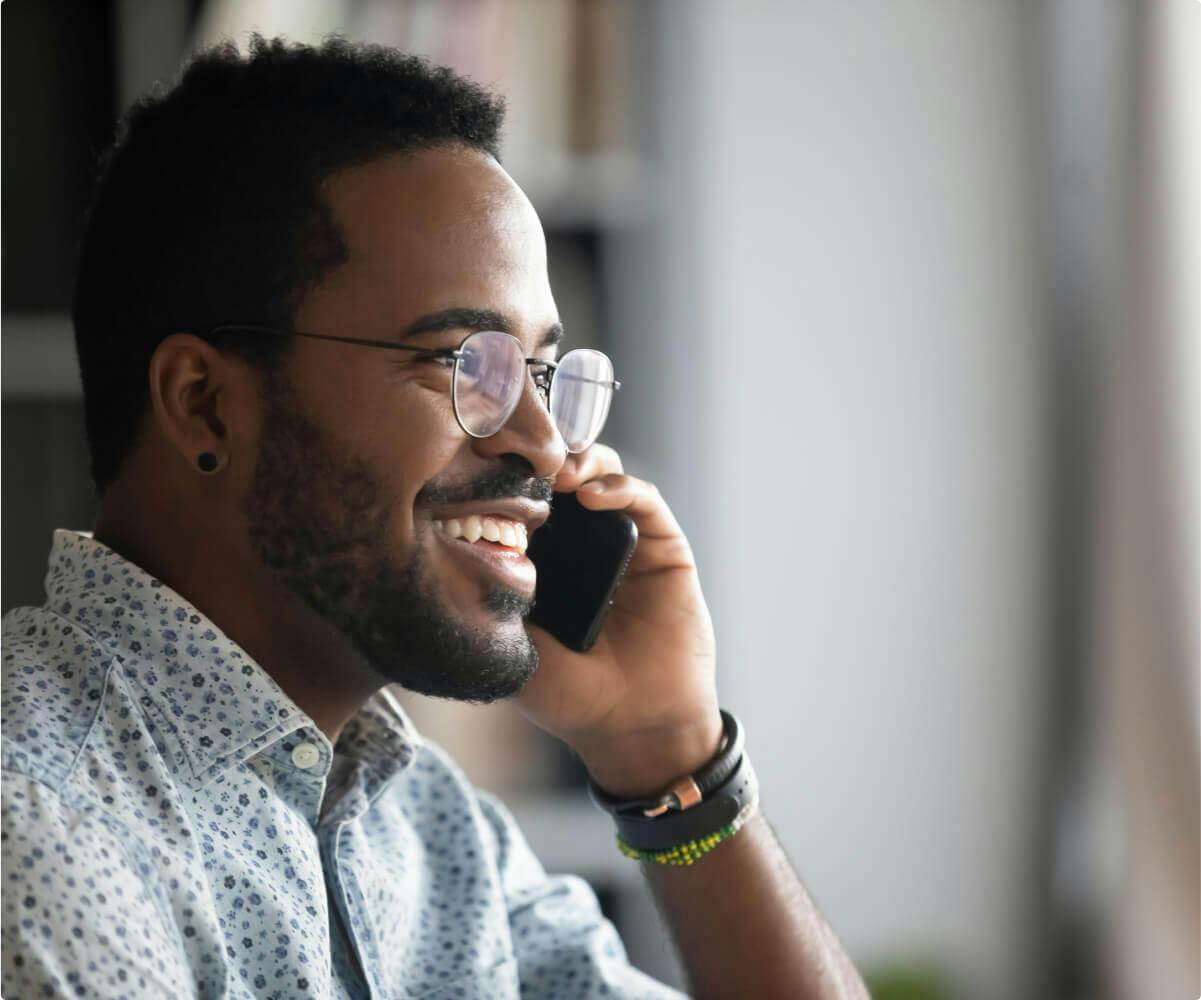 black-man-smiling-on-the-phone