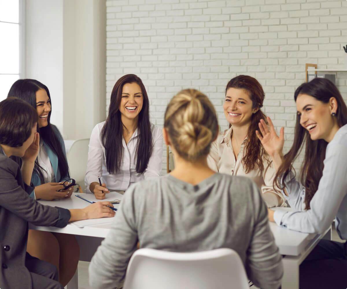 group-of-people-talking-and-laughing